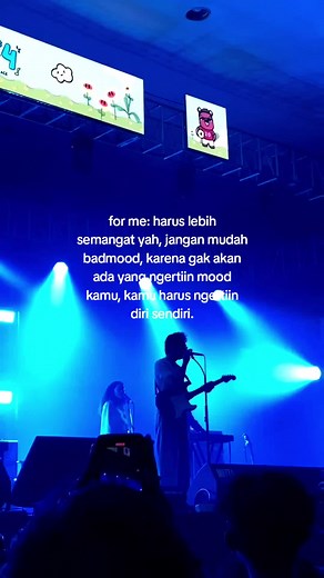 Live Concert Performance Featuring Guitarist and Vocalist