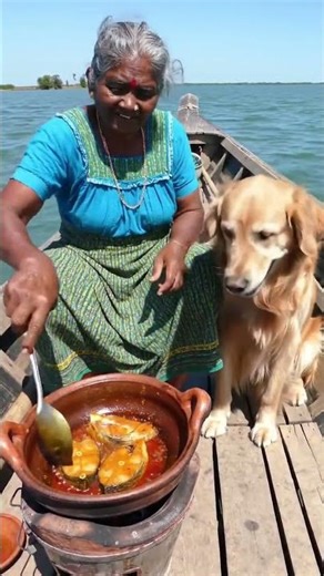 Sri Lankan Grandma and Dog Frying Fish Curry on a Boat” #food