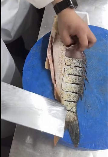 Chinese Chef Prepares Carp for Delicious Cooking