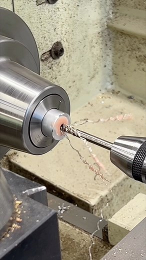 Let the lathe do the work — power tapping saves time and keeps threads straight. Just back it out before it bottoms! #MachinistTips #LatheWork #PowerTapping | High Caliber Craftsman Builds