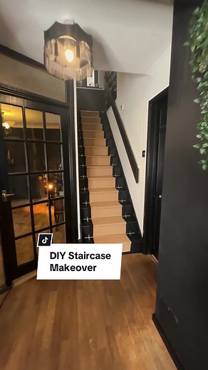 DIY Staircase Makeover: Black & Brass Transformation