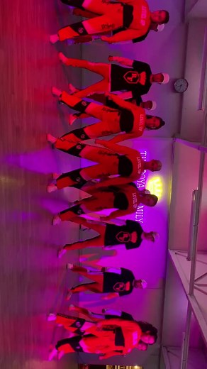 Synchronized Dance Routine Performance in Athletic Wear