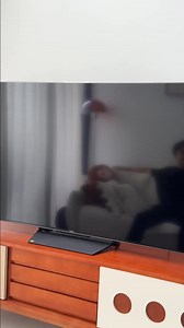 1K views · 24 reactions | ️ Benzo's lazy hack when his mom's not around? PRISM+ Google TV with voice control! Never reach for the remote again. Enjoy breathtaking 4K, Dolby Vision, and Atmos on a 65" QD Mini-LED for just $1,299. Smart tech, smarter price. Stop reaching, start watching with PRISM+ Mini-LED Google TV now!➡️ https://go.prismplus.sg/nQQLrC | PRISM+ | Facebook