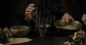 Alchemist and Herbalist Working in His Laboratory