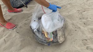 SPI beach cleanup volunteers help pickup after spring breakers