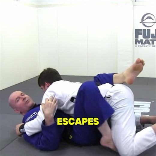 BJJ Fanatics on Instagram: "🔥 DAILY DEAL: 50% OFF — Pin Escapes & Turtle Escapes by John Danaher 🔥 Make your defense unbreakable John Danaher’s Go Further Faster series is back — this time, he’s showing you how to escape any pin or turtle control with precision, structure, and efficiency. Learn how to turn defensive positions into offensive opportunities and become nearly un-submit-able. 🚨 Available now in our DAILY DEAL — 50% OFF! 💥Use codeBACKONTHEMATS2026 for 49% off while it lasts. #bjjf