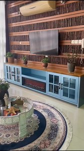 A Touch of Serenity! 💙 This stunning powder blue cabinet adds a refreshing contrast to the warm wooden tones, creating a statement in this elegant living space. it complements the cozy coffee corner, making it the perfect spot to unwind. A dream interior, delivered to our esteemed client in Banani! ☕✨ #PowderBlueElegance #CoffeeCornerVibes #LuxuryInteriors | Vanity - Furniture & Interior