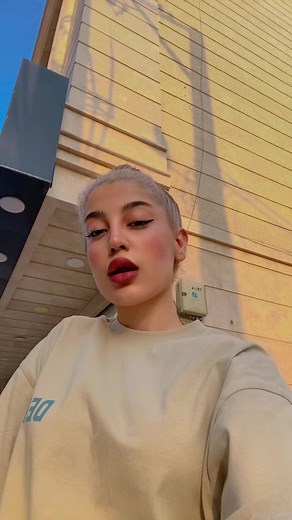 Urban Outdoor Fashion: Exploring Light-Colored Sweatshirts