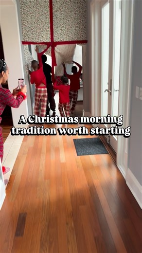 𝗣𝗼𝗿𝘁𝗶𝗮 𝗚𝗼𝗿𝗺𝗮𝗻 on Instagram: "How we set up our Christmas morning “run-through-the-wrapping-paper” tradition 🎁 aka my favorite Christmas morning hack! Step-by-step: 1. Pick the doorway/entry to your Christmas room (or the path to the tree). 2. Tape wrapping paper across the entry like a giant “wall.” (Tape the top + both sides.) 3. Add a second layer if your paper is thin or you want a bigger rip moment. 4. Reinforce the edges with extra tape so it stays up overnight. 5. Clear the fl