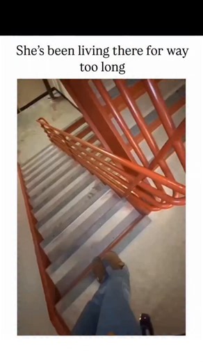 MULTIVRESAL KNOWLEDGE on Instagram: "The Instagram reel captures a woman confidently descending dimly lit stairs with red railings in what appears to be an apartment building, stepping over obstacles and navigating turns without pausing, highlighting her intimate familiarity with the space. , an account specialising in absurd yet relatable human moments, this clip has garnered over 74,000 views in under a day, with replies joking about her 'expert mode' navigation and long-term residency. This d
