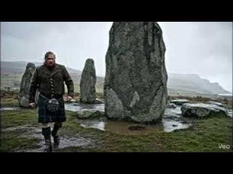 Scotsman Walking Wearing Kilt By Glengorm Standing Stones On Winter History Visit To Mull Scotland