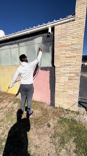 Graphite Coat on Colorful Wall Transformation