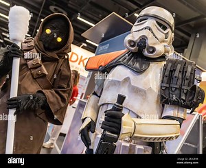 Cologne, Germany. 24th Aug, 2022. Gamescom 2022: Costumed cosplayer pose as characters of the Star Wars saga: a Jawa (left) and a Imperial Stormtrooper (right). Gamescom is the world's largest trade fair for computer and video games, at Koelnmesse in Cologne, Germany. Photocredit: Christian Lademann / lademann.media Stock Photo - Alamy
