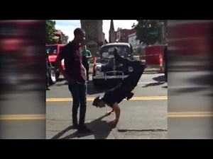 Police Officer Challenges Street Performer to Epic Dance Battle