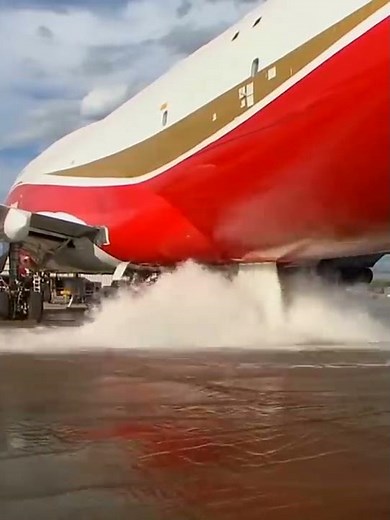 Airplane dropping water on the ground #Shorts