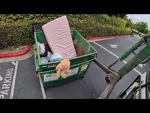 Waste Management front load commercial garbage truck