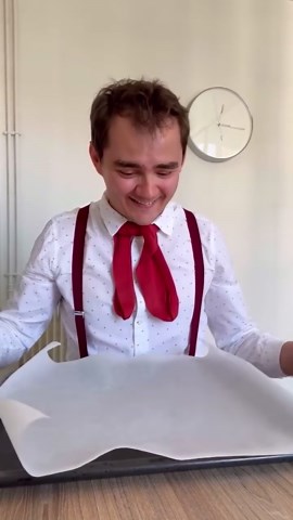 Stop parchment paper from rolling up