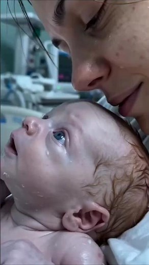 Mother and son looking at each other lovingly Cute Newborn Baby Video