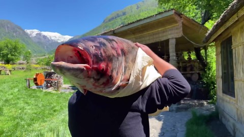 Giant 1.5 Meter Silver Carp Fried Over Open Fire