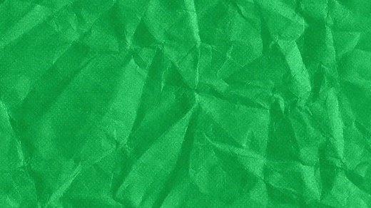 Download Crumpled paper, wrinkled paper texture stop motion seamless moving loop animation on green screen background for free
