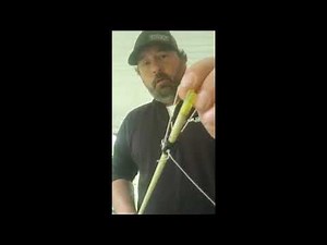 How to tie your bowfishing line to an arrow for a spincast reel fishing.