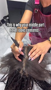 Part standing in front of your client not behind. Some braiders mess up the middle part before they even start parting because you’re parting from the wrong angle. When you stand directly in front of your client and try to “eyeball” the center, it feels right… but it actually throws your part off every single time. Here’s what I do instead: I start right at the center point of their head (the crown). I locate the middle of their face first, then glide the comb forward toward the hairline. This k