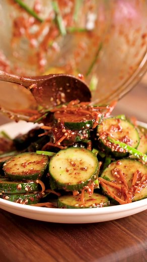 Let’s make Quick Cucumber Kimchi (Oi Muchim)! It's one of our favorite sides and it's very easy and quick to make! The full recipe is on our blog (twoplaidaprons.com) Just type