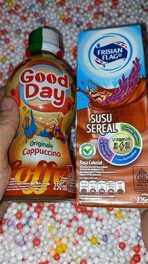 found good day originale cappuccino and frisian flag milk, chocolate cereal milk in a cardboard b...