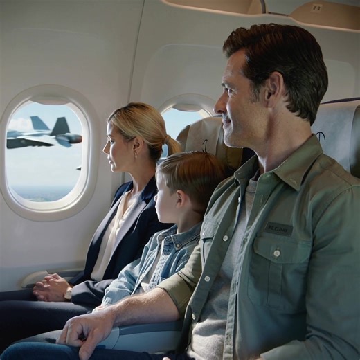 He sat in seat 12F—an ordinary American father in a worn, olive-green jacket, hair slightly tousled as if he’d just left the breakfast kitchen, not a cockpit. The eight-year-old beside him chattered about his new sneakers, and he simply listened, now and then giving that small hand a gentle squeeze as a promise: Dad is home, this time for real. The smell of coffee, the click of seat belts, the cabin lights winking on and off—everything was perfectly ordinary, except for the way his eyes kept dri