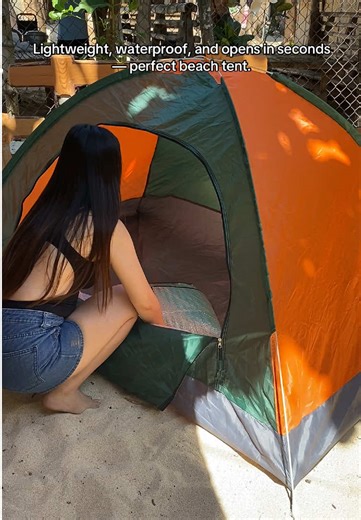 This quick-open tent is a beach essential — shade, wind protection, and super easy to assemble. #tent #campingtent #beachtent #foldabletent