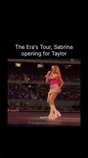 Celeb x Vybz on Instagram: "This clip is from Sabrina Carpenter opening for Taylor Swift on The Eras Tour. It shows Sabrina on a massive stadium stage, performing in front of tens of thousands of fans before Taylor comes on. She’s wearing her signature pink, retro-inspired outfit—corset-style top, mini skirt, white knee-high socks, and platform heels—which perfectly matches her playful, confident pop image. Opening for The Eras Tour was a major turning point in Sabrina’s career. Night after nigh