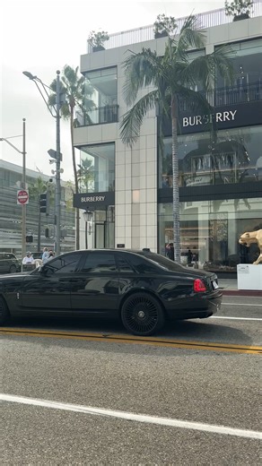 A blacked-out 2019 Rolls-Royce Ghost cruised down Rodeo Drive, radiating stealth wealth—the Ghost packs a twin-turbo V12 pushing 563 hp and originally cost around $315K.#RollsRoyce #Ghost #RodeoDrive #BH #carspex #fblifestyle | CarSpex