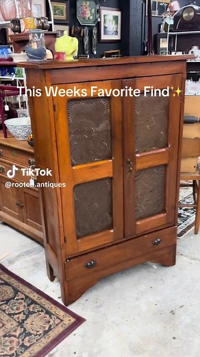 We love this petite 19th-century pie safe 🤎 Featuring pierced tin panels, rich wood tones, and original charm throughout. A versatile statement piece for almost any space. Now available at Rooted Antiques and Vintage. #AntiqueFinds #PieSafe #antiquelovers #AntiqueShopFinds #InteriorInspo