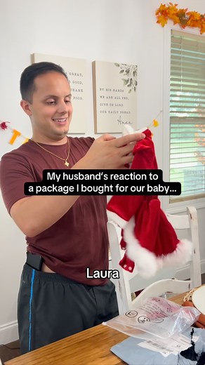 His reaction says it all 🤣 I saw this baby Santa outfit and had to get it 🙈🎅🏼🎄 I can’t wait for all the memories with our baby girl 💗 Adam’s going to be the best girl dad — here’s to more outfits & holiday magic ✨ #couplescontent #pregnancyjourney #reels #couples #pregnant #couplecomedy #lauraandadam | Laura and Adam