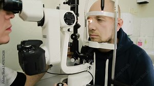 Man taking eye test examination