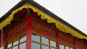 Tengboche Monastery in Nepal detail shot of colourful monastery in the Himalay's of Nepal. Exterior curtains blowing in the wind. Filmed in 60fps optioned to be slowed down.