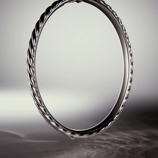 Discover David Yurman's signature Sculpted Cable, elegantly carved from 18K gold and set with brilliant pavé diamonds. | David Yurman