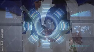 Interface fading in with rotating rings as lab technicians touching UI aligning device for testing