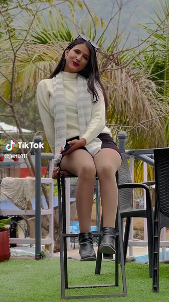 Outdoor Fashion Look: Young Woman in Cozy White Sweater