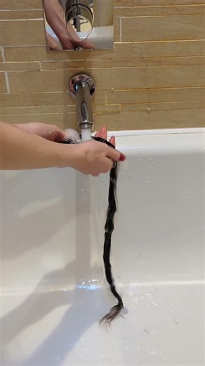 The first thing you should do when you receive your extensions? Wash them.