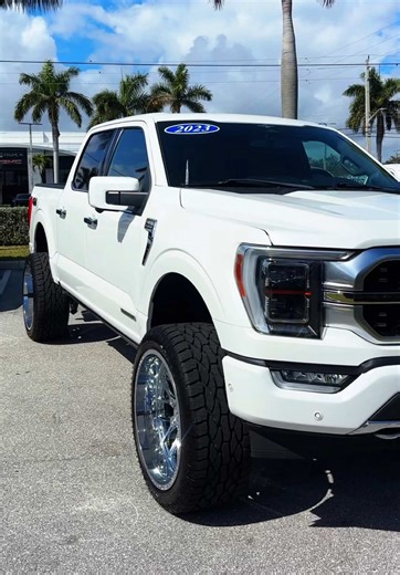 2023 Ford F-150 Platinum 💎 — Sitting bold on chrome Axe Off-Road rims with the off-road package to match and to top it off black and tan stitched seats for that luxury vibe💥 DM to set up a test drive with me🙃