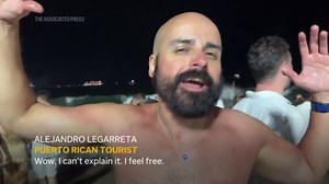 Tens of thousands cheer on Copacabana Beach as Rio welcomes new year with fireworks display
