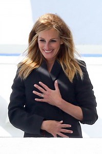 Julia Roberts shows off her famous legs at a photo shoot in Malibu ahead of 50th birthday