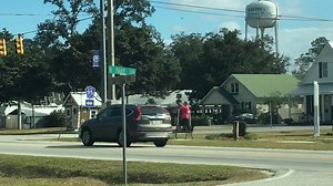 Inspirational 'Dancin Queen' Julie Anna Brown has been sighted greeting passers-by at numerous area intersections recently. Find out more in her book 'Finding My Light' or 'Outdoor Dancing' facebook page. #dancinggirl #julieannabrown #silverhillalabama #baldwincountyalabama #fairhopealabama | Fairhope Times