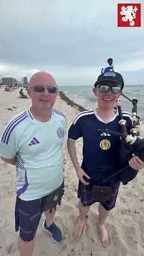 A young piper jumped straight from Miami airport into the Tartan Army march