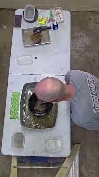 Panning out paydirt tailings after running thru the Mini sluice box