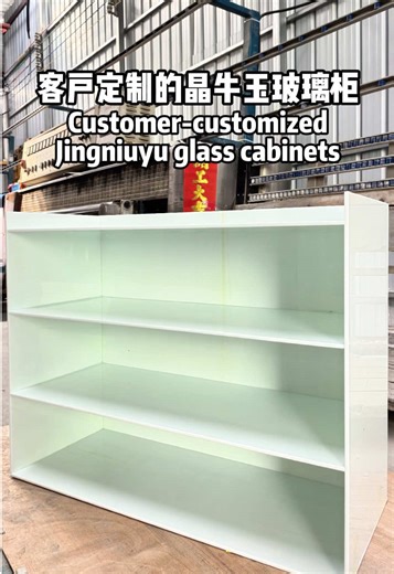 Crystal Jade Glass Display Cabinet Production Process | High-Transparency Decorative Glass Cabinet Manufacturing Crystal Jade glass is becoming increasingly popular in high-end display cabinets and decorative spaces due to its unique texture and high transparency. During the production process, we use precision cutting, edging, and professional glass bonding techniques to assemble multiple pieces of Crystal Jade glass into a stable and visually elegant glass cabinet structure. Glass bonding requ
