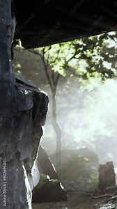 Shaft of light beaming down into large cave Stock Video