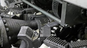 Manufacture of plastic water pipes. Manufacturing of tubes to the factory. The process of making plastic pipes on the machine tool with the use of water and air pressure. Special corrugated forms of