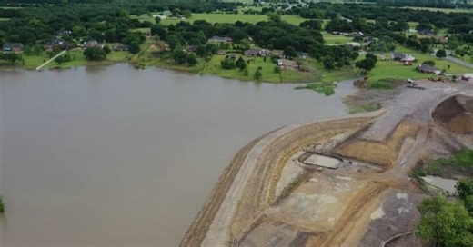 A fatal flood prompted dam repairs. Then, the federal government froze funding.